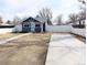 Charming home with updated fencing and a concrete pad, enhancing curb appeal and privacy at 1164 Wabash St, Denver, CO 80220