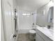 Bathroom featuring a tub and shower combination and tile flooring at 1164 Wabash St, Denver, CO 80220