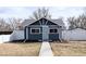 Charming single-story home with a well-maintained front yard and attractive curb appeal at 1164 Wabash St, Denver, CO 80220