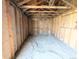 Shed interior features concrete floor and unfinished walls offering storage solutions at 1164 Wabash St, Denver, CO 80220