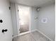 The utility room is easily accessible from the adjacent living space at 1164 Wabash St, Denver, CO 80220