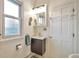 Cozy bathroom with a modern floating vanity at 3201 S Clarkson St, Englewood, CO 80113