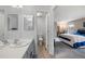 Bathroom featuring a vanity, framed mirrors, and a toilet in a separate space at 7272 E Appleton Cir, Centennial, CO 80112