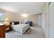 Relaxing bedroom with plush carpet, closet, and natural lighting at 7272 E Appleton Cir, Centennial, CO 80112