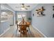 Dining room with light flooring and natural light, perfect for Gathering meals at 7272 E Appleton Cir, Centennial, CO 80112