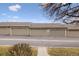 Exterior view of the community garages, showcasing multiple units and parking spaces with visible street numbers at 7272 E Appleton Cir, Centennial, CO 80112