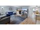 Cozy living room with a fireplace, comfortable seating, and stylish decor at 7272 E Appleton Cir, Centennial, CO 80112