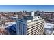 Aerial view of building with rooftop pool and city views at 1029 E 8Th Ave # 501, Denver, CO 80218