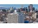 High-rise building with city skyline in background at 1029 E 8Th Ave # 501, Denver, CO 80218