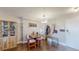 Small dining area with a wooden table and chairs near the entryway at 1029 E 8Th Ave # 501, Denver, CO 80218