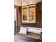 Cozy porch with a hanging wooden swing offering a relaxing outdoor space for enjoying the view at 1055 S Clayton Way, Denver, CO 80209