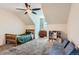 Cozy bedroom featuring vaulted ceilings and comfortable carpet at 9929 W Fairview Ave, Littleton, CO 80127