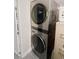 Laundry area featuring modern LG stackable washer and dryer at 2865 Newland St, Wheat Ridge, CO 80214