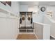 Hallway mudroom features built-in storage cubbies and bench, perfect for organization at 2865 Newland St, Wheat Ridge, CO 80214
