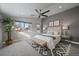 This bedroom features a modern ceiling fan and lots of natural light from a window with outside views at 1437 Garfield St, Denver, CO 80206