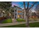 Contemporary townhomes feature modern design, gray exterior, balconies, and well-manicured lawns, perfect for urban living at 1437 Garfield St, Denver, CO 80206