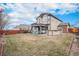 Large backyard with a gazebo, grill area, lawn and mature trees at 15776 E 107Th Way, Commerce City, CO 80022