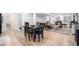 Finished basement area including dining, living, and entertaining spaces at 15776 E 107Th Way, Commerce City, CO 80022