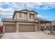 Inviting two-story home with attached garage and landscaped front yard at 15776 E 107Th Way, Commerce City, CO 80022
