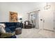 Comfortable living room with stylish decor and lots of natural light at 15776 E 107Th Way, Commerce City, CO 80022