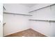 Large walk-in closet with double hanging rods and shelves at 23881 E 40Th Ave, Aurora, CO 80019