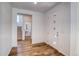 Bright entryway with modern front door and staircase at 23881 E 40Th Ave, Aurora, CO 80019