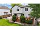 Charming two-story home featuring a backyard deck and lush landscaping, perfect for outdoor entertaining and relaxation at 13307 Humboldt Dr, Thornton, CO 80241