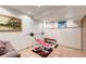 Finished basement with fitness equipment, neutral walls, and recessed lighting at 13307 Humboldt Dr, Thornton, CO 80241