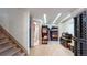 Finished basement includes storage, shelving, and a nearby bathroom with stairwell access at 13307 Humboldt Dr, Thornton, CO 80241