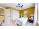 This cozy bedroom features bright walls, a window, and a ceiling fan at 13307 Humboldt Dr, Thornton, CO 80241