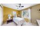 Comfortable bedroom with a large window, ceiling fan, and tasteful décor at 13307 Humboldt Dr, Thornton, CO 80241