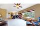 Spacious living area featuring a large window and an open connection to the kitchen at 13307 Humboldt Dr, Thornton, CO 80241