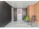 Inviting covered patio with a seating area and a view of the front entrance at 3400 Garland St, Wheat Ridge, CO 80033
