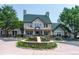 Front exterior view of a welcoming clubhouse with well manicured landscaping and circular driveway at 1862 Mallard Dr, Superior, CO 80027