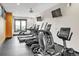 A bright gym featuring modern treadmills and a television at 1862 Mallard Dr, Superior, CO 80027