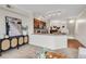 Open-concept kitchen with granite countertops and stainless steel appliances, seamlessly connected to the living area at 1862 Mallard Dr, Superior, CO 80027