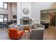 Inviting community lounge area with stone fireplace, comfortable seating, and a servery at 1862 Mallard Dr, Superior, CO 80027