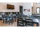 Inviting community lounge area featuring multiple tables, a television, and comfortable seating at 1862 Mallard Dr, Superior, CO 80027