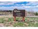 Park sign in a natural setting with a view of houses in the background at 1862 Mallard Dr, Superior, CO 80027