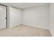 Bedroom with neutral carpeting, a closet, and white walls at 3061 W 92Nd Ave # 14A, Westminster, CO 80031