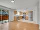 Kitchen with stainless steel appliances, light wood cabinets, and a sliding glass door to the backyard at 3061 W 92Nd Ave # 14A, Westminster, CO 80031