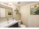 Clean bathroom with modern fixtures, vanity, and decorative wall art at 6132 W 113Th Ave, Westminster, CO 80020