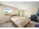 Comfortable bedroom with natural light and neutral decor at 6132 W 113Th Ave, Westminster, CO 80020
