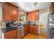Updated kitchen with stainless steel appliances and granite countertops at 6132 W 113Th Ave, Westminster, CO 80020