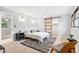 Calm bedroom features a sliding barn door to closet and modern decorations creating a cozy atmosphere at 4682 Chatham St, Boulder, CO 80301