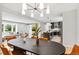 Inviting dining area with modern lighting and views of the kitchen and living spaces, perfect for entertaining at 4682 Chatham St, Boulder, CO 80301