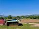 Local farm stand featuring 'Sweet Corn' sign, with view of the Colorado mountains in the background at 4682 Chatham St, Boulder, CO 80301