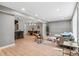 Spacious open-concept living area with modern decor, a connected dining space, and lots of natural light at 4682 Chatham St, Boulder, CO 80301