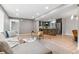 Open-concept living room with easy access to kitchen, offering a seamless transition between relaxation and meal preparation at 4682 Chatham St, Boulder, CO 80301