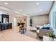 Open concept living room and kitchen area with modern furnishings, hardwood floors, and stylish decor at 4682 Chatham St, Boulder, CO 80301